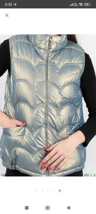 Жіноча жилєтка.,