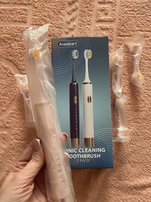 Електрична зубна щітка і насадки. США