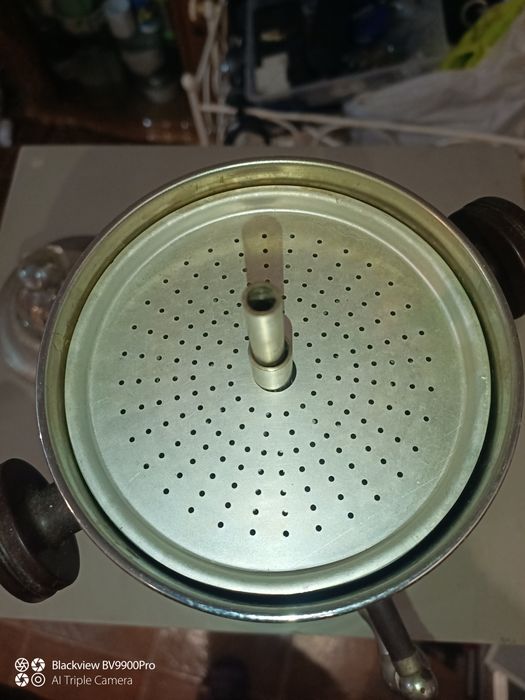 Máquina de café mas bem antiga