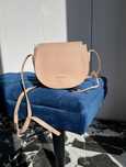 Torebka Coccinelle Clementine Soft pudrowy róż crossbody Safiano