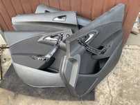 Astra j komplet tapicerek drzwi hb/sedan 4 el szyby