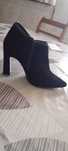 Botas novas em pele de marca