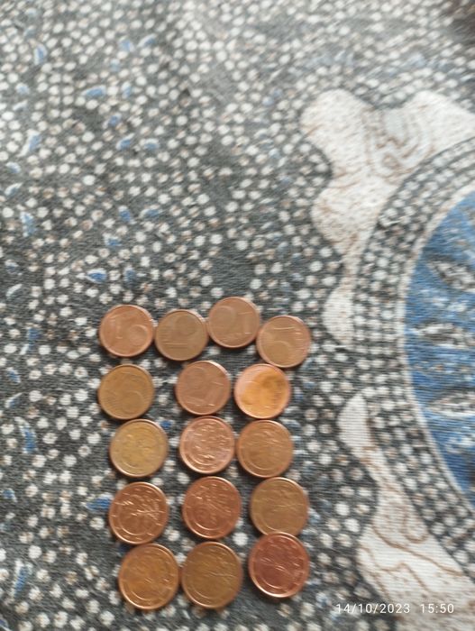 Medas raras .de 1  centimo de euros com símbolo de um trevo