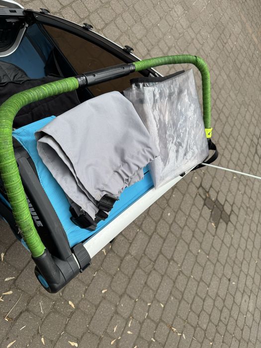 Przyczepa rowerowa thule cross 2 z zestawem biegowym oraz 1 śpiworem