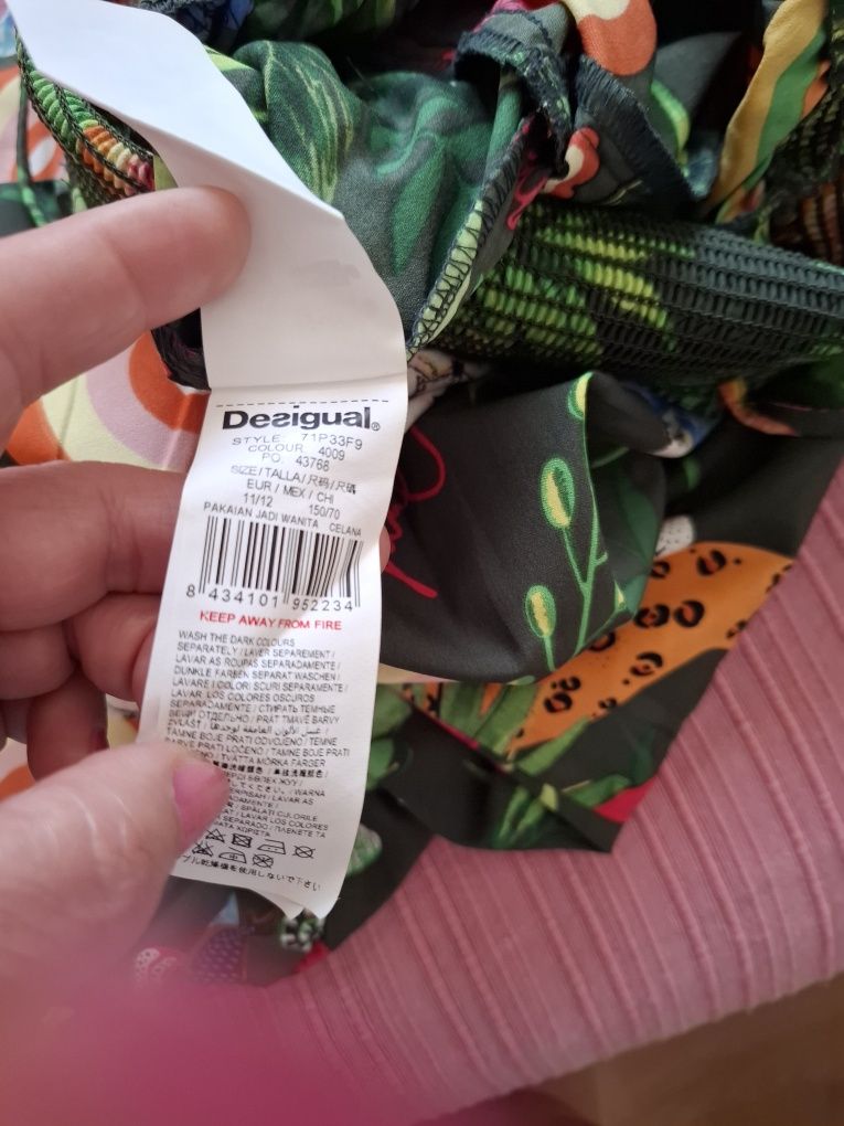 Macacão de calças da Desigual em bom estado para tamanho  11-12