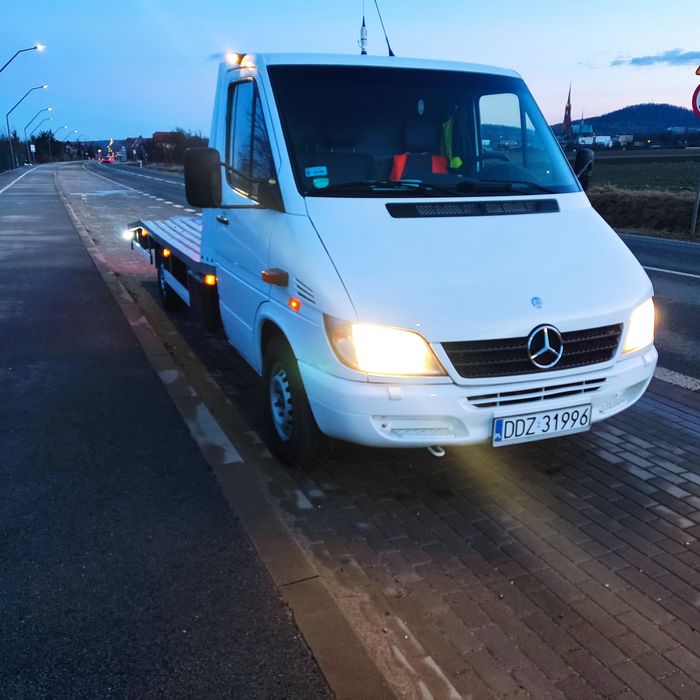 Pomoc drogowa holowanie laweta autolaweta