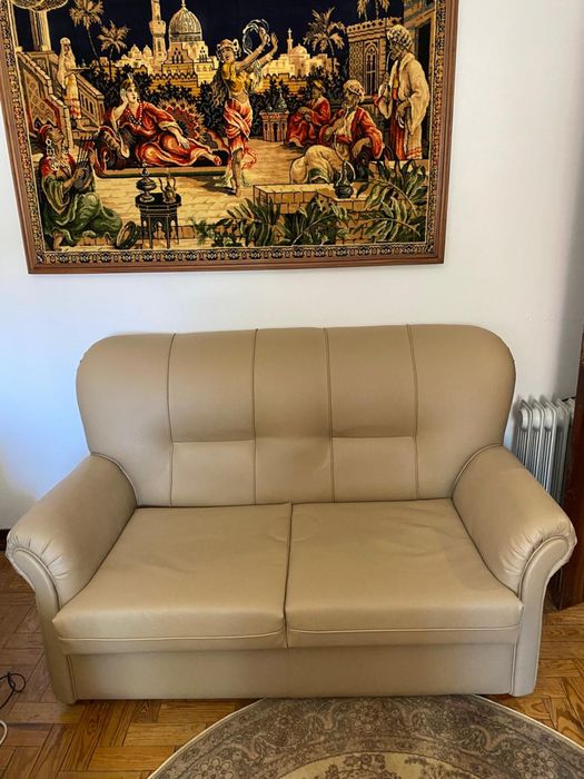 Sofas cremes de pele como novos