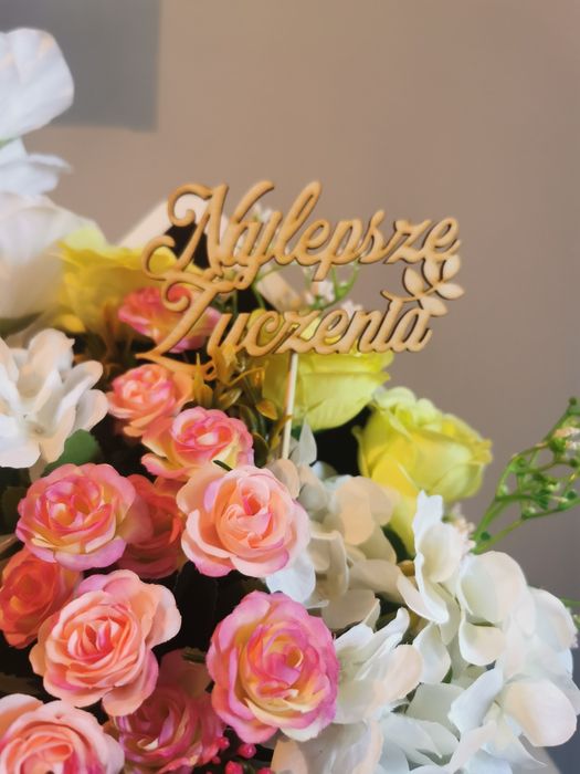 Kompozycja kwiatów w kopercie