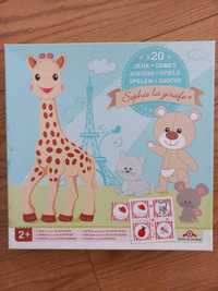 Caixa com diversos jogos da girafa sofia para criança
