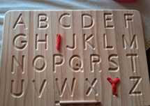 Drewniana tablica z literkami edukacyjna typu Montessori