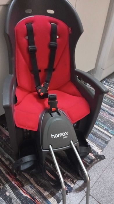 Cadeirinha de bicicleta incluso o capacete em ótimo estado de uso