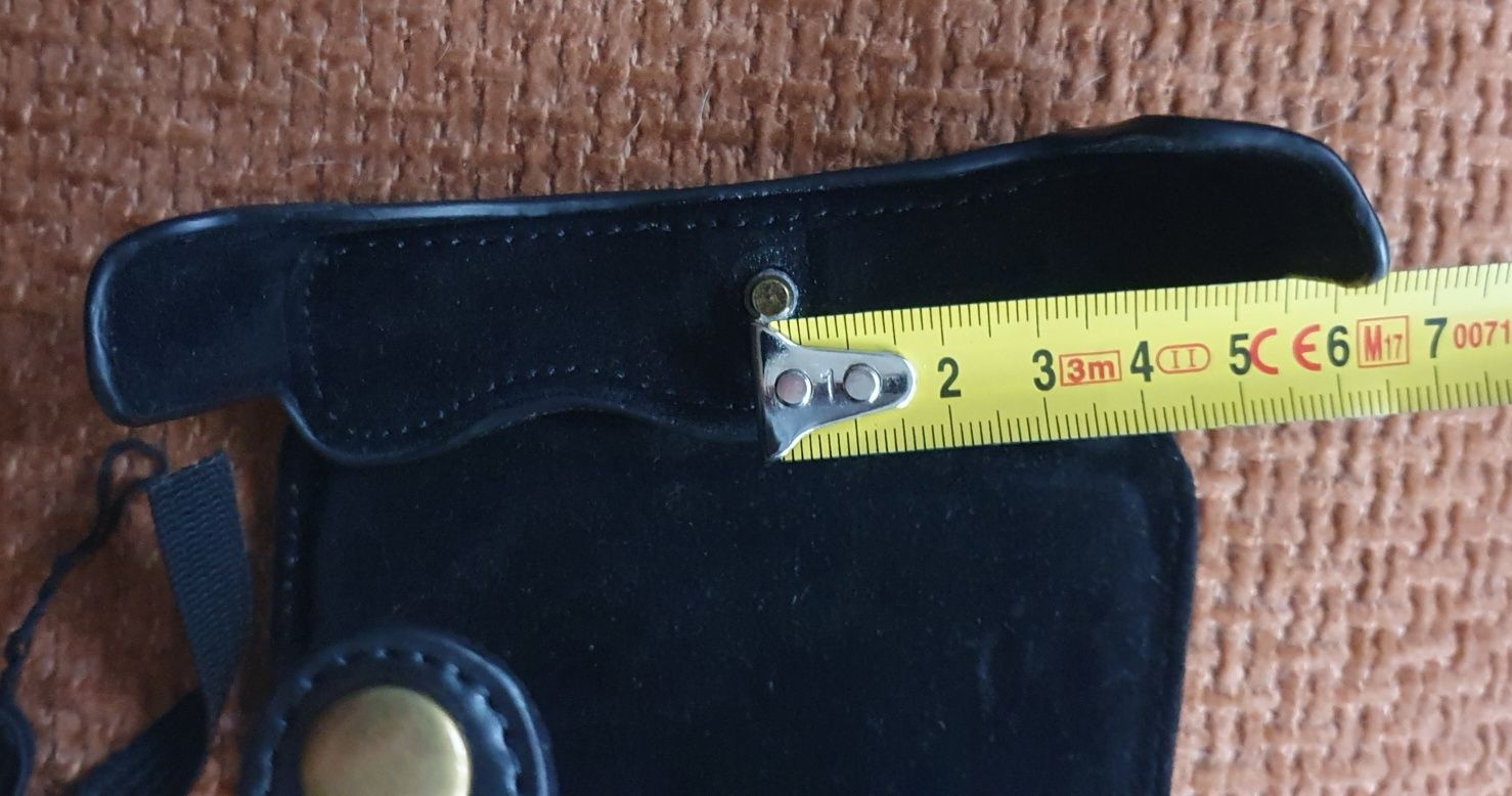 Etui Lumix 15 i inne że sobą po środku okazja
