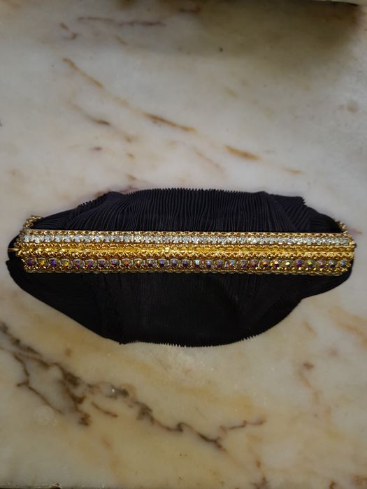 Luvas e pochetes vintage