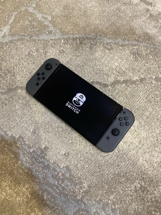 Nintendo Switch Oled / k€fir / 128gb