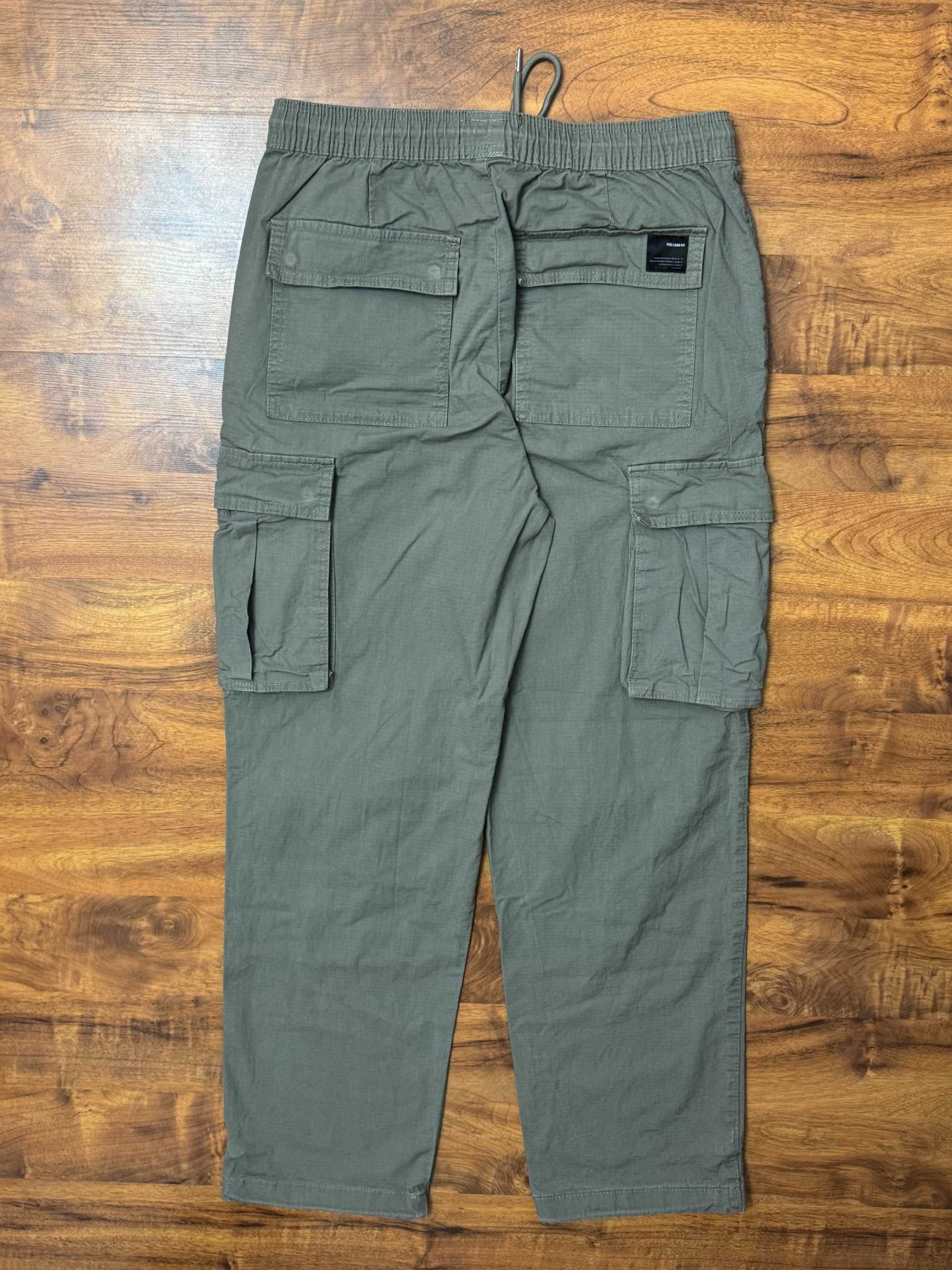 Spodnie materiałowe szare khaki na gumce cargo bojówki Pull Bear S