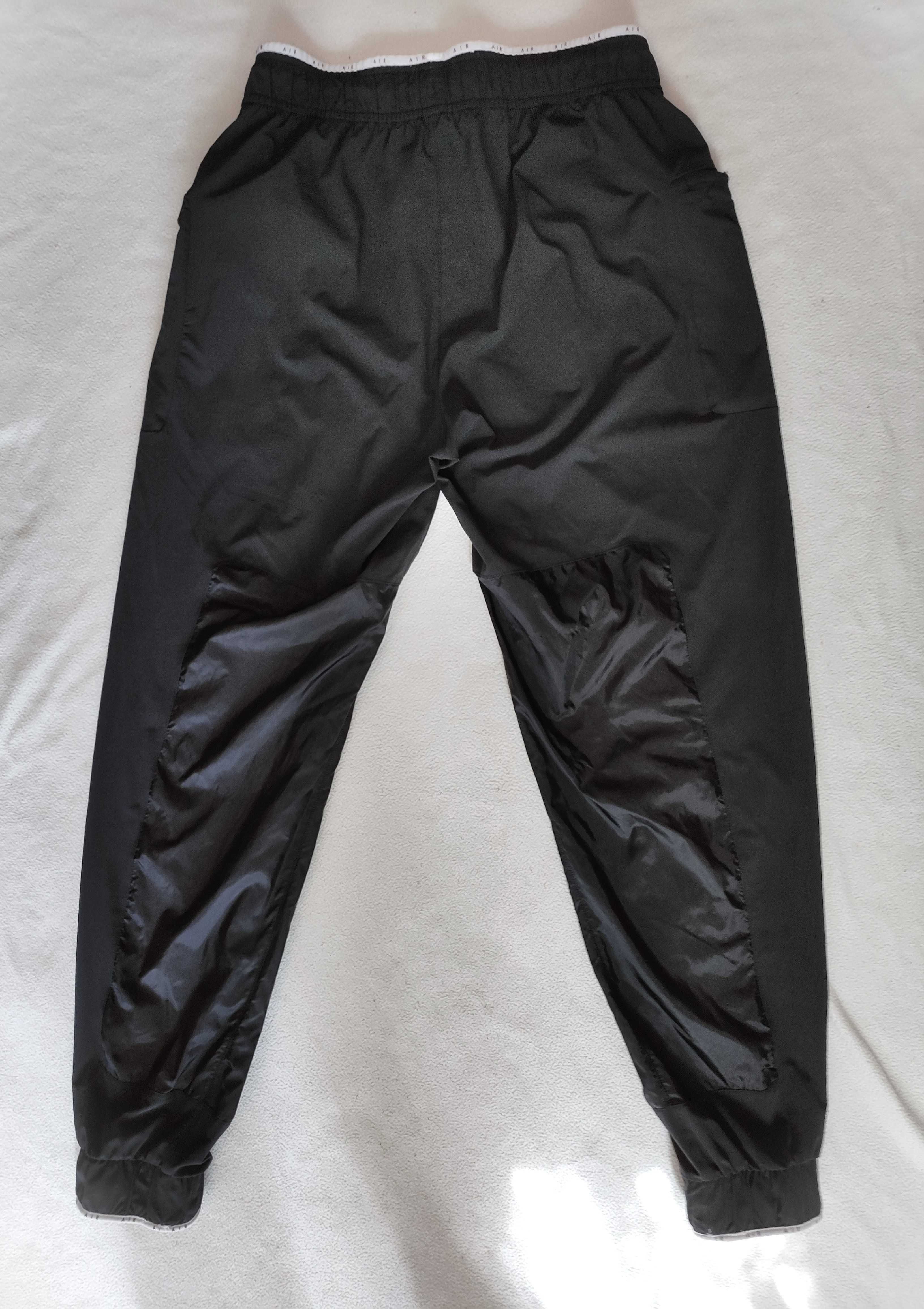 czarne spodnie dresowe/dresy r. 40/42 Nike