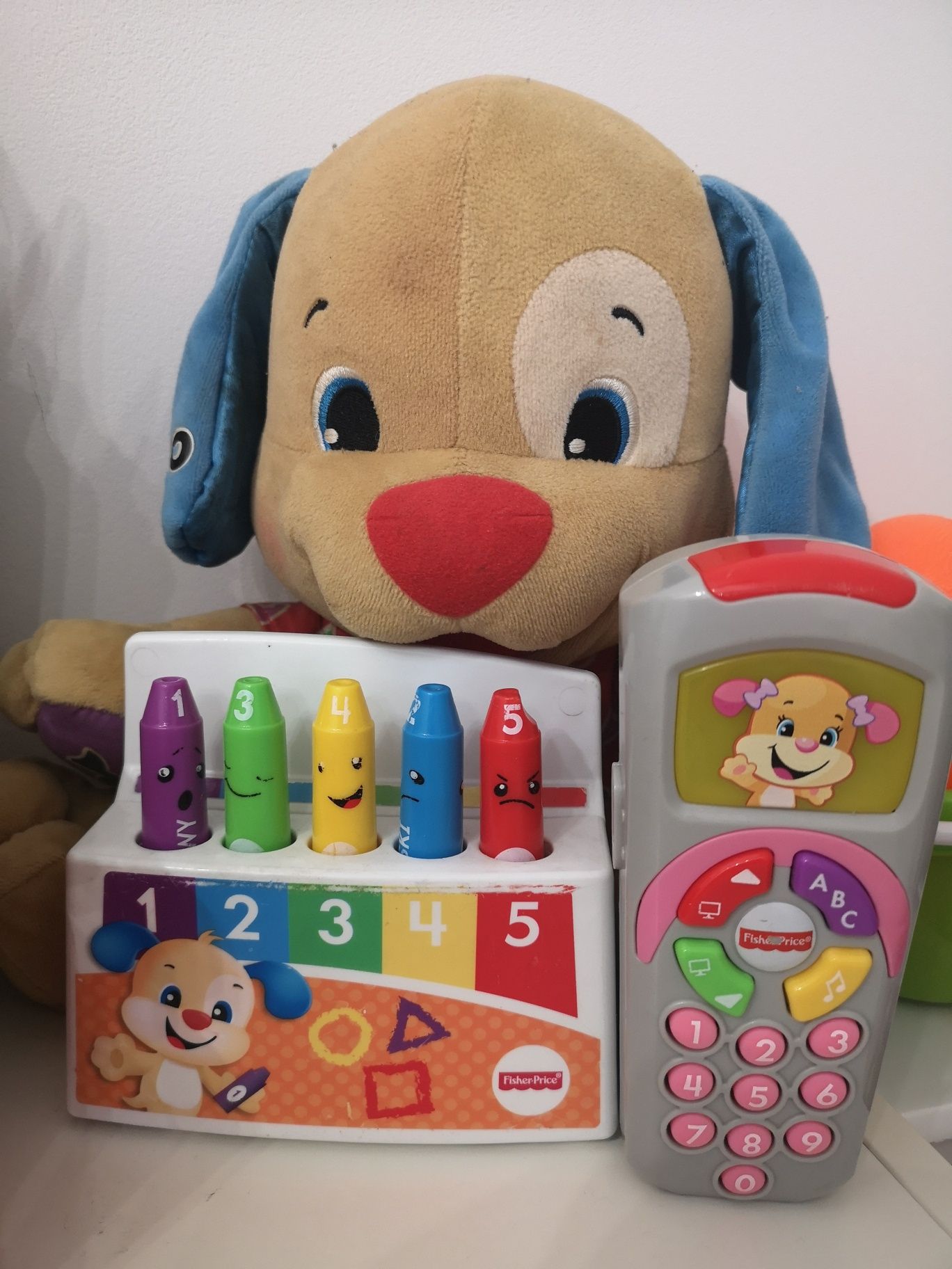 Szczeniaczek pilot muzyczne kredki Fisher price