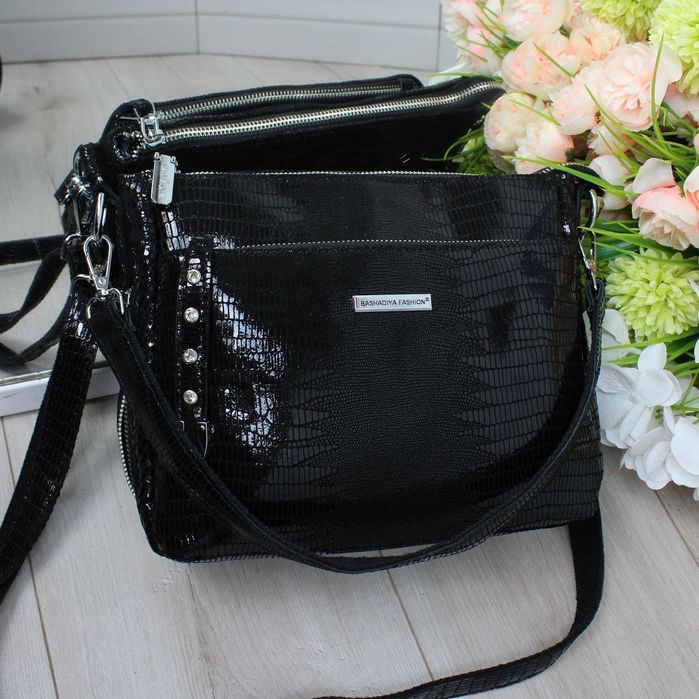 Неймовірна жіноча сумка із лазерної натуральної шкіри