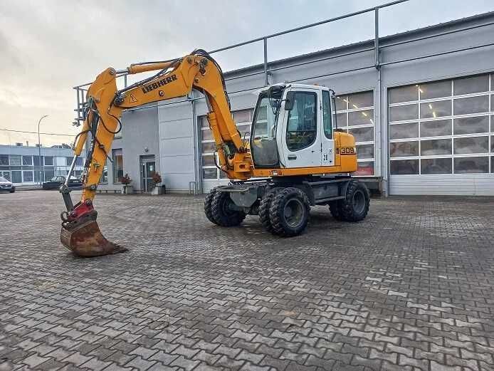 Koparka Kołowa Liebherr A309 -- Wynajem