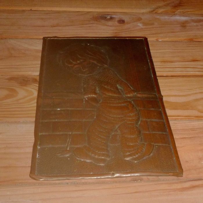 табличка пісающий хлопчик