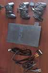 Playstation 2 com 3 comandos e cartão de memória