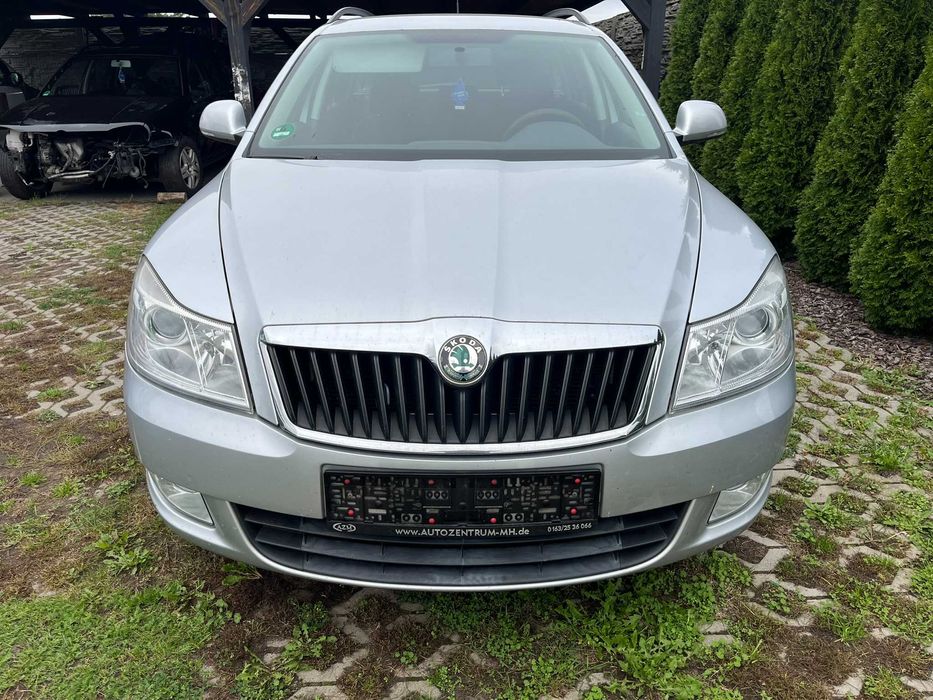 zderzak maska lampa błotnik przód lewy prawy pas skoda octavia ii 9156