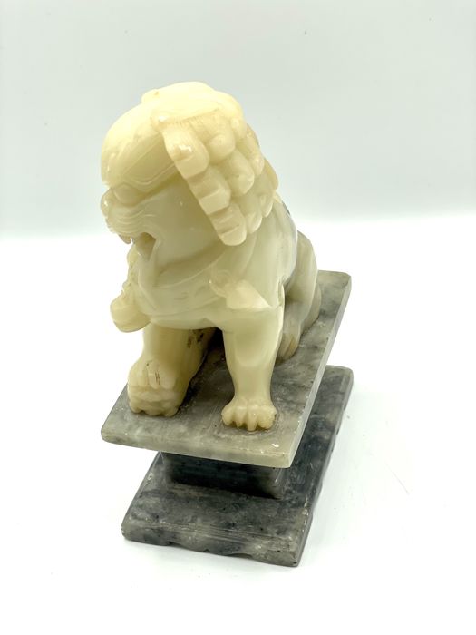 Cao foo em pedra oriental