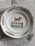 Porcelana Bogucice talerzyk deserowy z kotkiem PRL 17 cm malowany