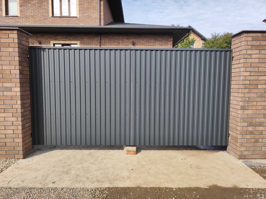 ... SaneX - Group ... Фабрика воріт та металоконструкцій