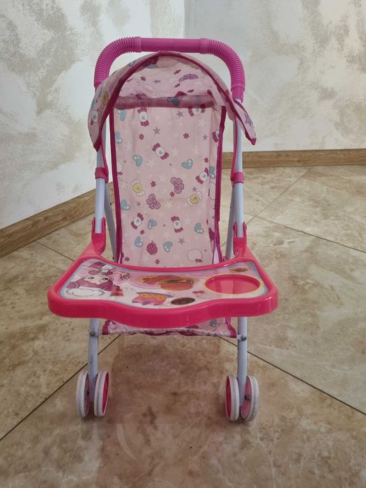 Іграшкова дитяча коляска для кукол