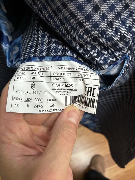 Стильний піджак у клітинку в чудовому стані