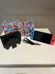 Nintendo Switch + 3 gry + pokrowiec