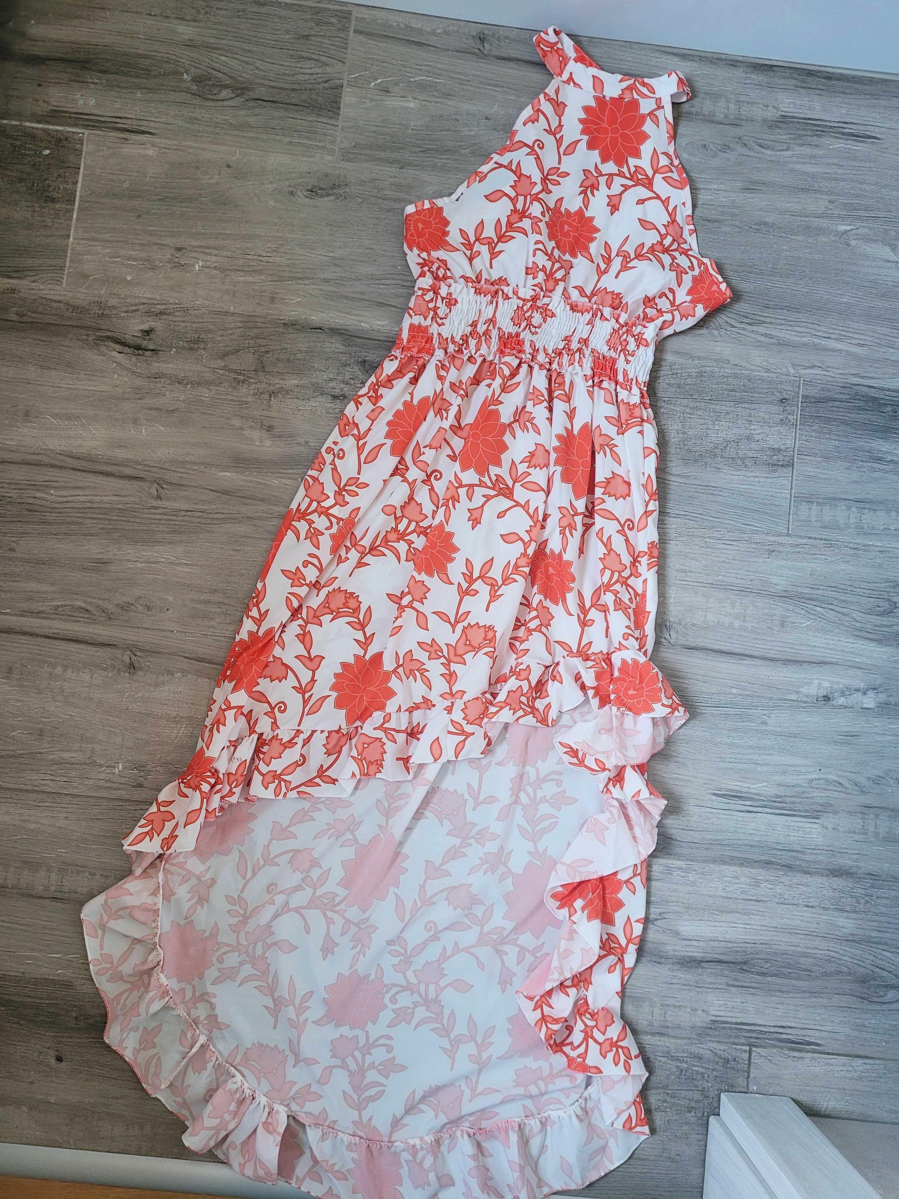 Zwiewna asymetryczna sukienka dekolt halter boho falbana
