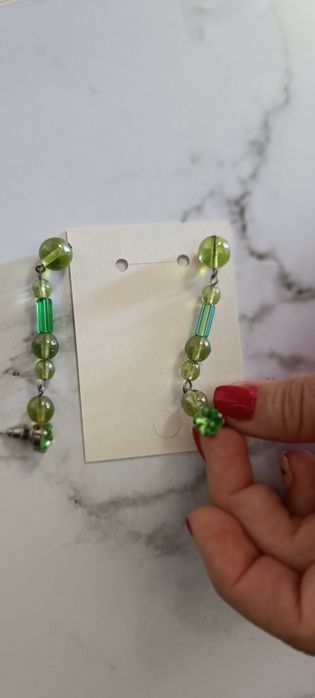 Brincos compridos verdes
Usados 
Em bom estado