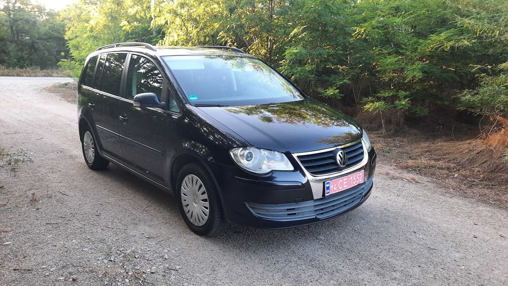 Тауран Touran Volkswagen