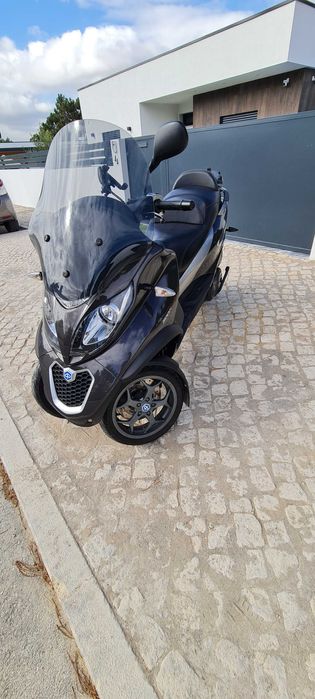 mp3 500. apenas 23817kms com revisao. de garagem estimada. CARTA B