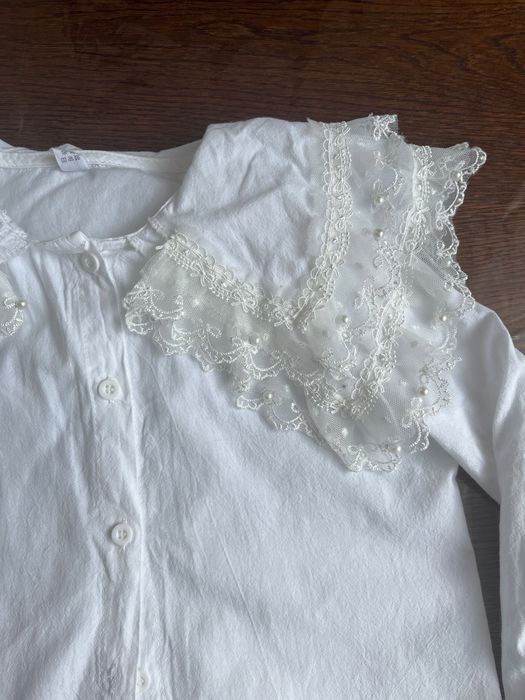 Біла блузка для дівчинки