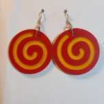 Wooden earrings in the shape of spirals.