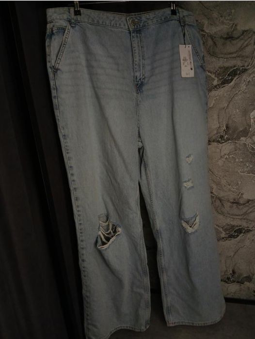 Нові джинси з біркою