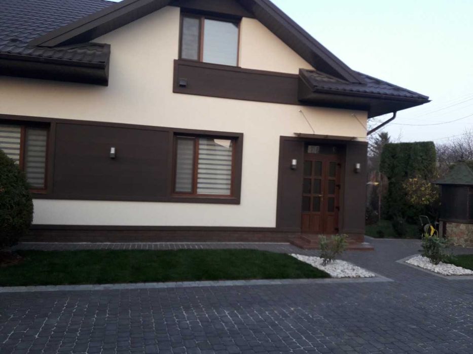 Фасади з композитної фасадної дошки