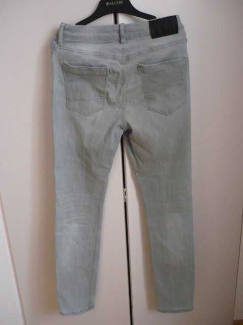 chłopięce jeansy marki Reserved rozmiar 164 cm