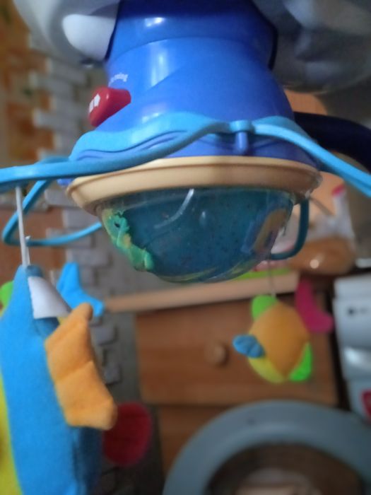 Заколисуючий центр, гойдалка дитяча