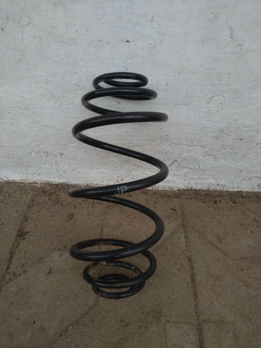 Пружина задньої  підвіски автомобіля Опель Астра G . Оригінал.