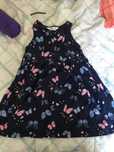 Roupa de menina em bom estado