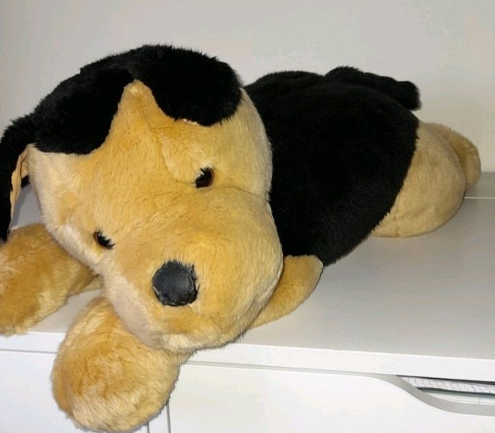 cão de peluche de criança