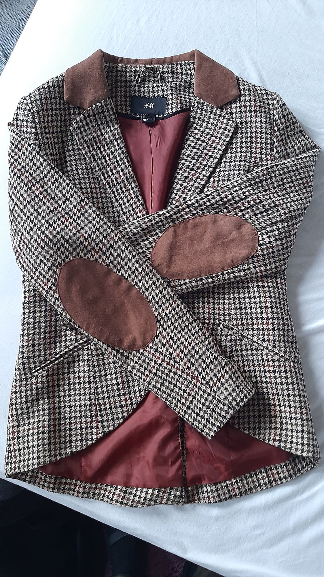 Elegancka taliowama marynarka z wełny w pepitkę
