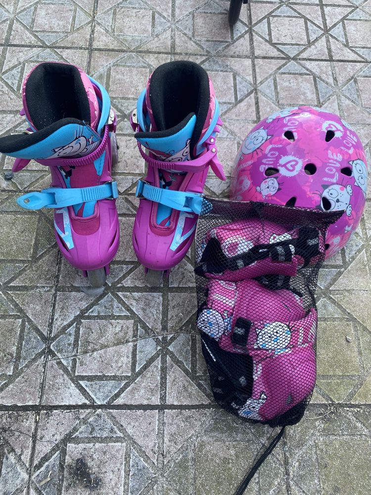 Patins menina com proteções e capacete