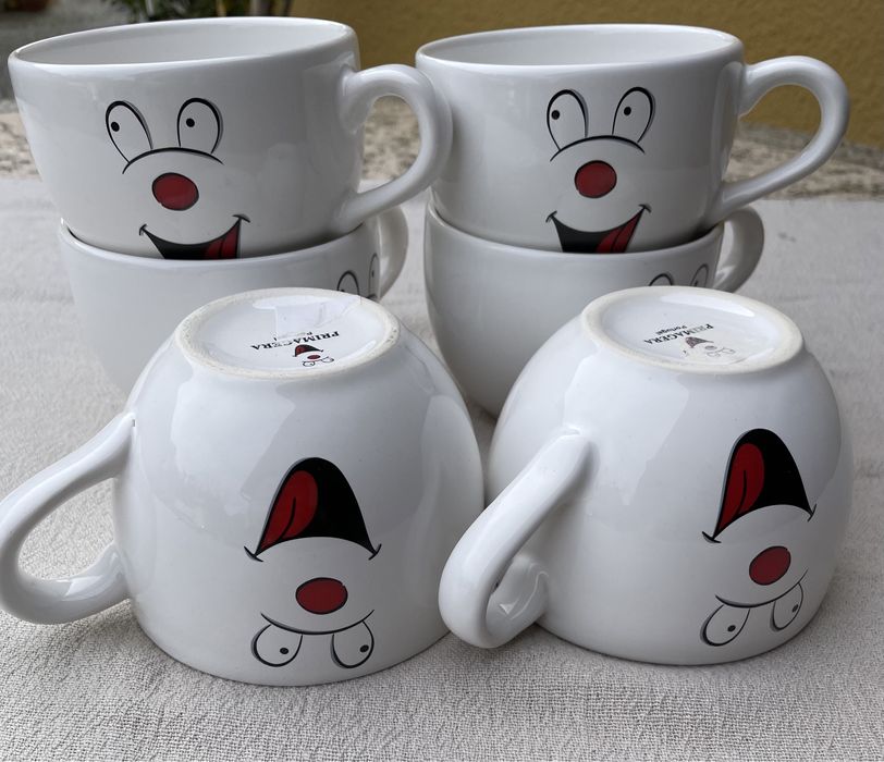 Seis tijelas de pequeno almoço de louça branca, com desenhos