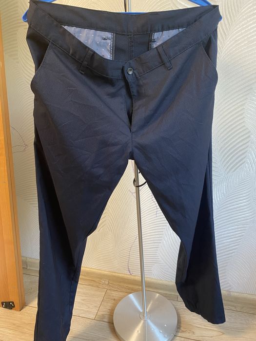 Брюки темно синие в мелкую клетку на мужчину или подростка