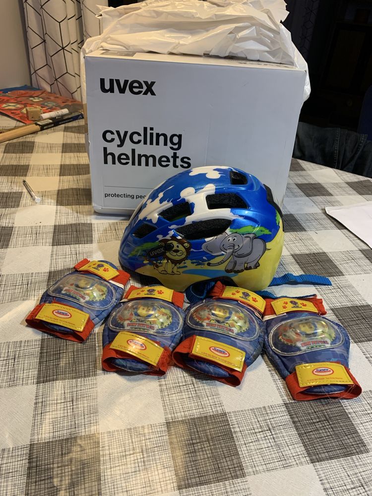 Kask dziecięcy UVEX i ochraniacze psi patrol 47-52cm lampka w kasku